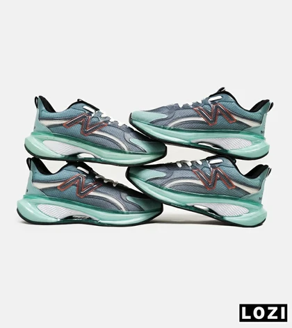 کفش کتانی مردانه و زنانه طوسی سبز NEW BALANCE More Trail v3