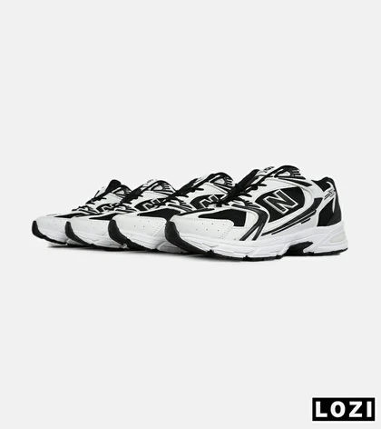 کفش کتانی مردانه و زنانه سفید مشکی NEW BALANCE 530