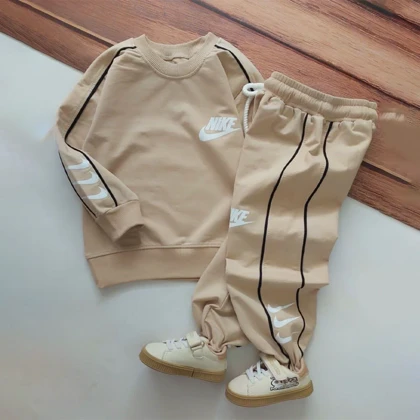 بلوز شلوار بچه گانه طرح نایک بغل خط‌دار