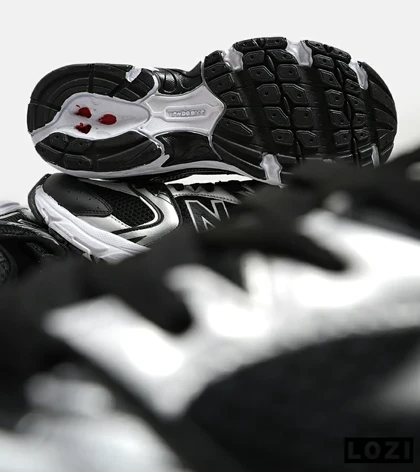 کفش کتانی مردانه و زنانه مشکی نقره ای NEW BALANCE 530