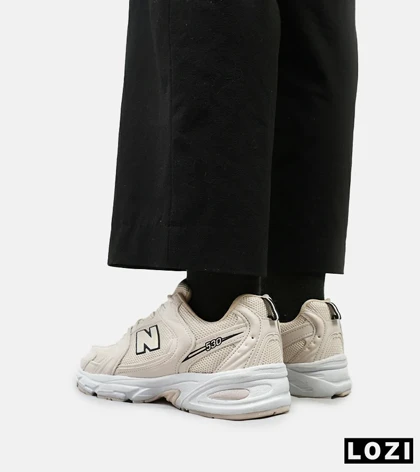 کفش کتانی مردانه و زنانه کرم NEW BALANCE 530