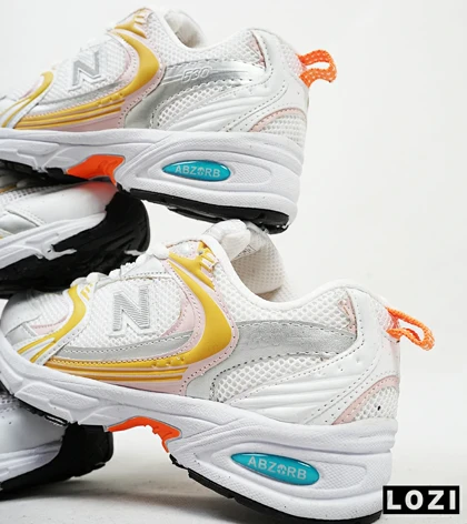 کفش کتانی زنانه صورتی زرد NEW BALANCE 530