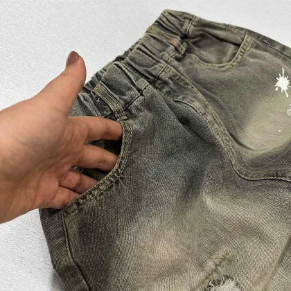 شلوار جین مام زاپ‌دار پشت جیب خرسی