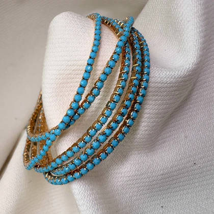 دستبند تنیسی مدل «فیروزه درخشان» | آبی مات بر پایه طلایی (فروش دانه‌ای)