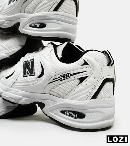 کفش کتانی مردانه و زنانه سفید مشکی NEW BALANCE 530 مدل 4974