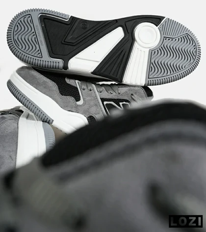 کفش کتانی مردانه و زنانه طوسی مشکی NEW BALANCE 550