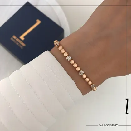 دستبند کارتیه گوی آینه‌ای و نگینی