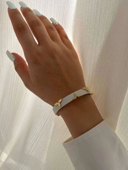 دستبند چرم زنانه طرح لویی ویتون با قفل کمربندی شیک