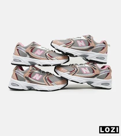 کفش کتانی مردانه و زنانه طوسی گلبهی NEW BALANCE 530