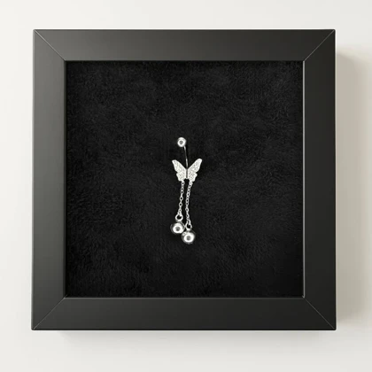 پیرسینگ ناف نقره مدل پروانه با آویز زنگوله