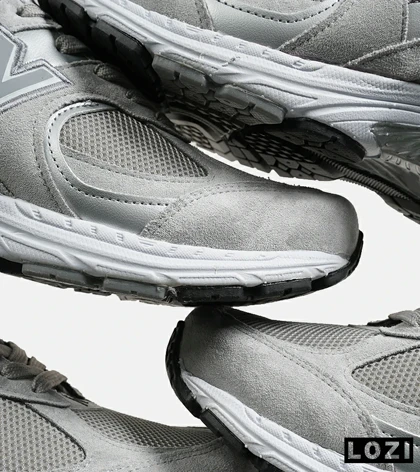 کفش کتانی طوسی NEW BALANCE 2002R