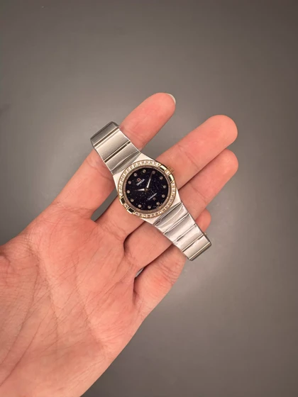 ساعت مچی امگا کانستلیشن صفحه کهکشانی قاب دورنگین Omega Constellation