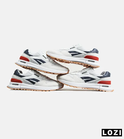 کفش کتانی سفید سرمه ای REEBOK Unphased Pro