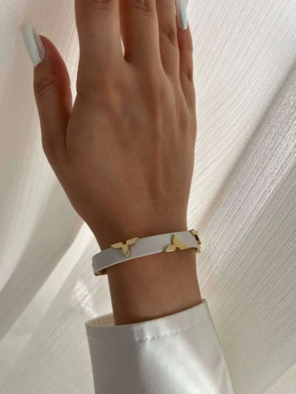 دستبند چرم زنانه طرح لویی ویتون با قفل کمربندی شیک