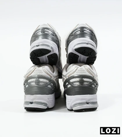 کفش کتانی سفید طوسی طلایی Newbalance 1906R