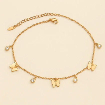 پابند زنانه استیل طلایی با آویز پروانه و نگین – Xuping