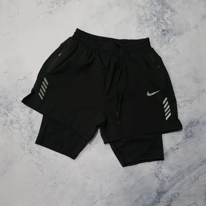 ست تاپ و شلوارک کشاله دار نایکی با 2 رنگ + جوراب