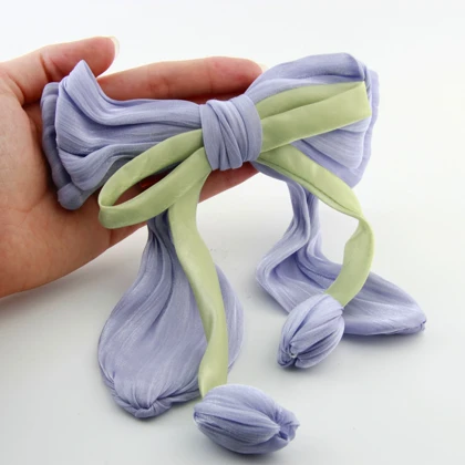 گیره مو پاپیونی طرح گل لاله