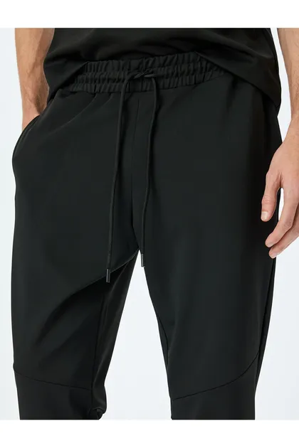 شلوار ورزشی Jogger با جزئیات دوخت و دور کمر توری 5SAM40012NK