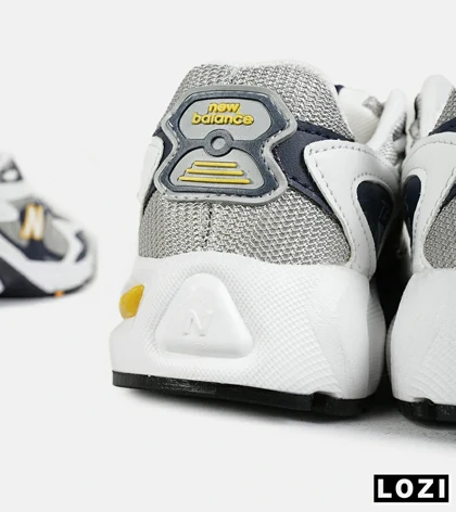 کفش کتانی مردانه و زنانه طوسی زرد مشکی NEW BALANCE 725
