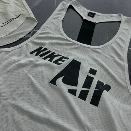 ست رکابی پشت کش نایکی + شلوارک آیرو نایکی + جوراب ساق‌دار کد E207