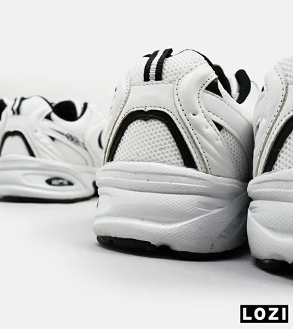 کفش کتانی مردانه و زنانه سفید مشکی NEW BALANCE 530 مدل 4974