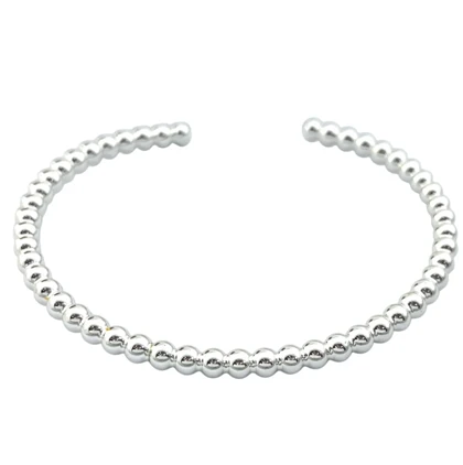 دستبند زنانه بنگل مدل اوربینا طرح گوی‌های نقره‌ای مینیمال
