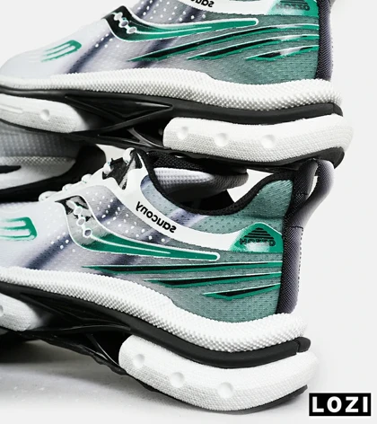 کفش کتانی سفید مشکی سبز Saucony Axon 3