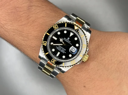 ساعت مچی رولکس سابمارینر سوئیسی سیلورطلایی صفحه مشکی Rolex Submariner