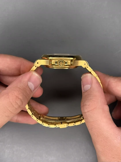 ساعت مچی پتک فیلیپ بند طلایی موتور اتوماتیک صفحه سفید Patek Philippe Nautilus