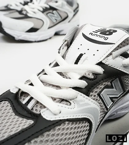 کفش کتانی مردانه و زنانه سفید خاکستری NEW BALANCE 530 مدل 4073