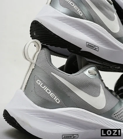 کفش کتانی زنانه و مردانه طوسی Nike guide 10