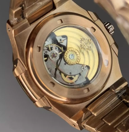 ساعت مچی پتک فیلیپ اتوماتیک بند فلزی رزگلد صفحه سرمه ای Patek Philippe Nautilus