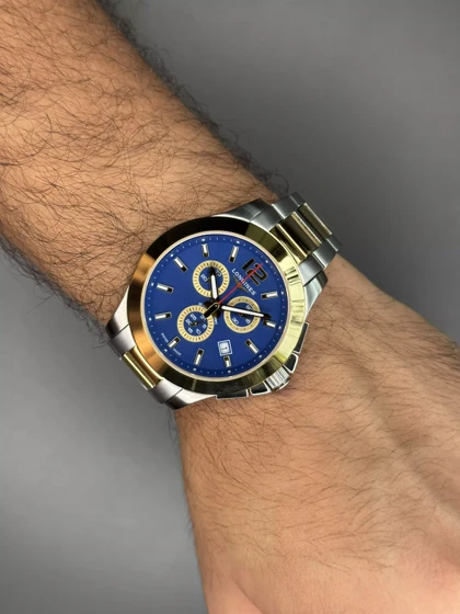 ساعت مچی لونژین کورنوگراف صفحه سرمه ای بند سیلور طلایی Longines
