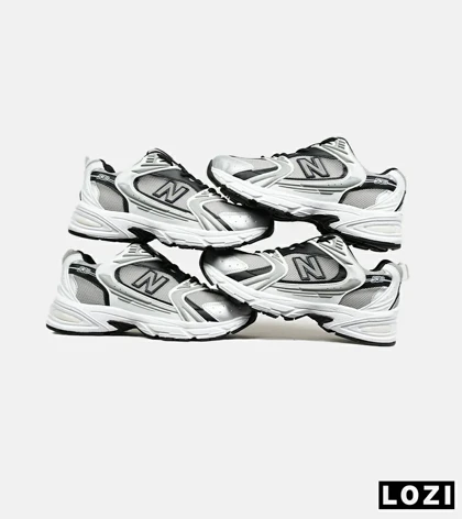 کفش کتانی مردانه و زنانه سفید طوسی مشکی NEW BALANCE 530 مدل 6642