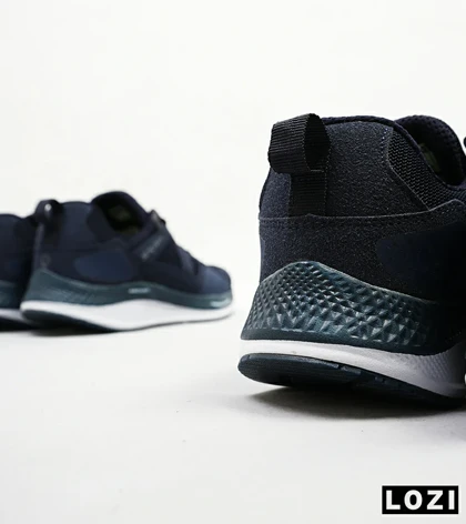 کفش کتانی طبی زنانه و مردانه سرمه ای SKECHERS archfit v02