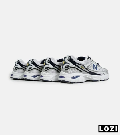 کفش کتانی مردانه و زنانه سفید سرمه ای NEW BALANCE 1064 V.2