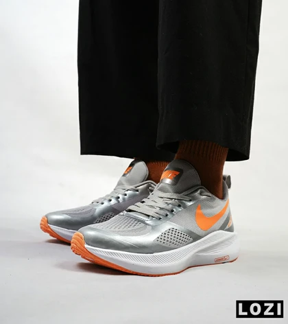کفش کتانی مردانه طوسی نارنجی Nike guide 10