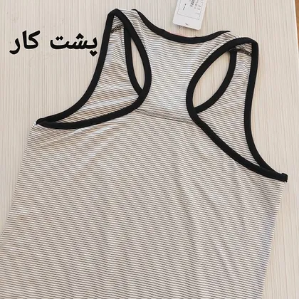 تاپ قهرمانی زنانه نایک راه راه ریز سایز 36 38