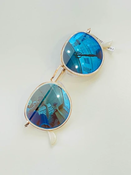 عینک گرد دور صدفی