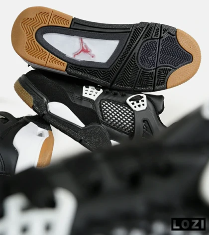 کتانی ساق‌دار بزرگ پا مشکی سفید Nike air jordan 4