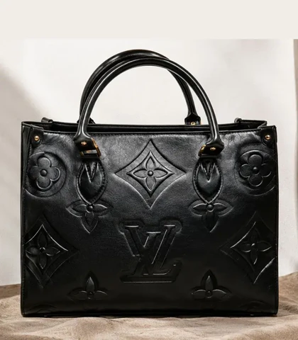 کیف زنانه چرم حکاکی ال وی LV مدل LV80010