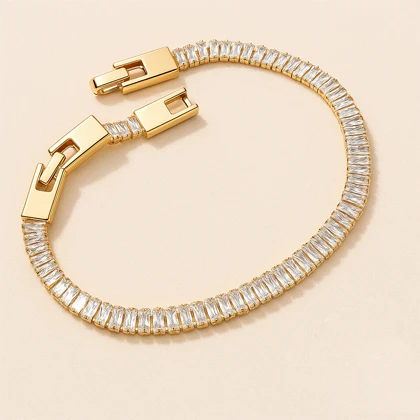 دستبند زنانه ژوپینگ طلایی با نگین‌های ردیفی براق | طرح لاکچری و خاص