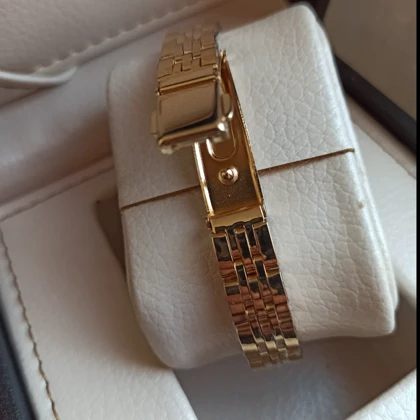 ساعت مچی زنانه اسپریت بند متصل طلایی صفحه سبز