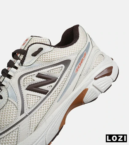 کفش کتانی مردانه و زنانه کرم قهوه ای NEW BALANCE 1064 V.2 مدل 8333