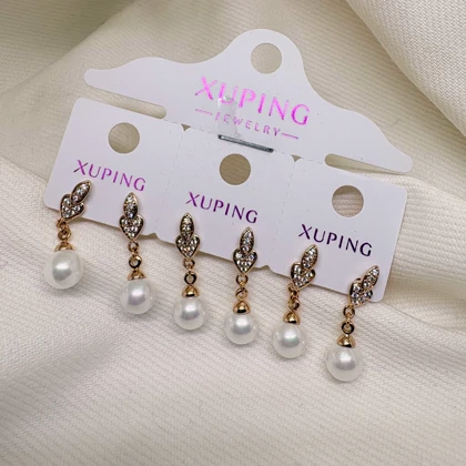 گوشواره ژوپینگ مدل «برگ و مروارید» | رقص مروارید زیر سایه درخشان