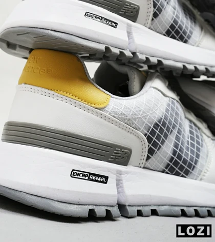 کفش کتانی سفید طوسی زرد NEW BALANCE 1300