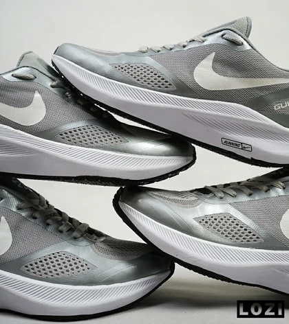 کفش کتانی زنانه و مردانه طوسی Nike guide 10
