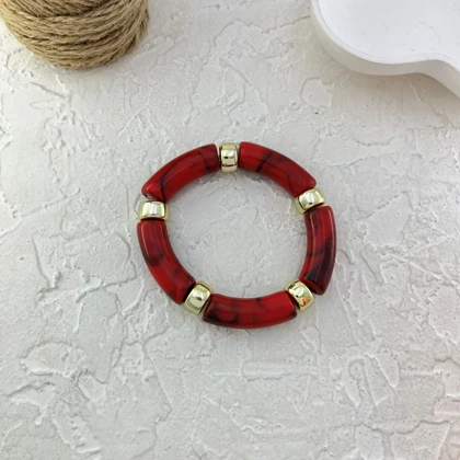 دستبند زنانه بنگل رزینی چندتکه مدل روبینورا یاقوتی‑طلایی