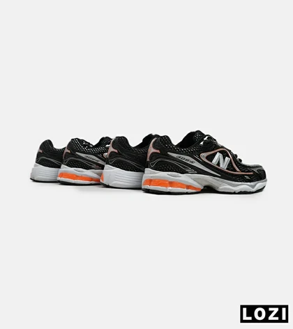 کفش کتانی مردانه و زنانه مشکی نارنجی NEW BALANCE 1064